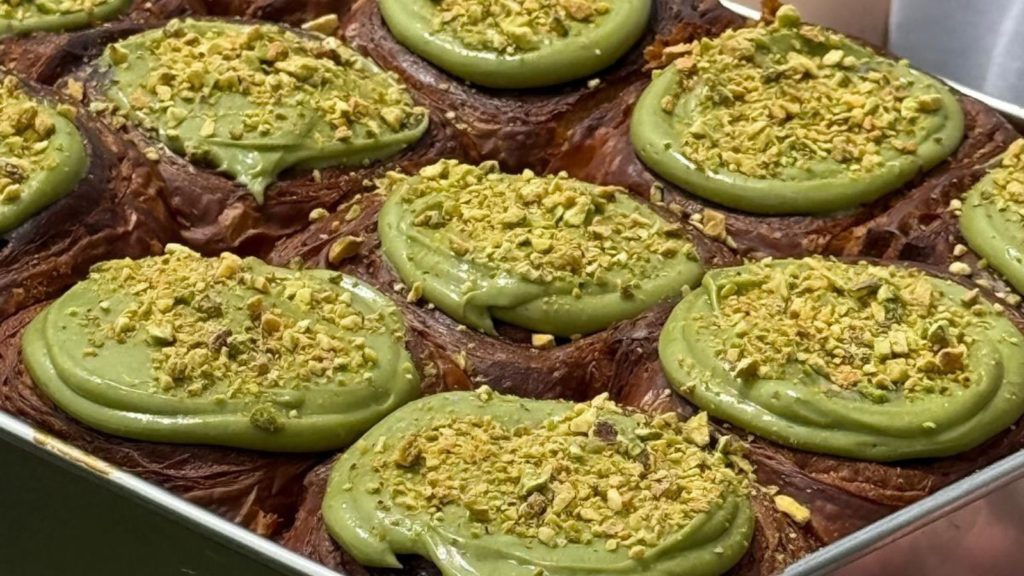 Brotherbird Bakehouse Pistachio Croissant Rolls topped with pistachio cream and crushed pistachios in Singapore.